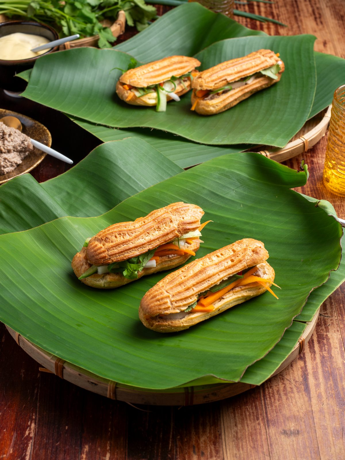 Banh mi eclairs on banana leaf